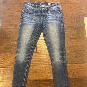 Excellent condition buckle black jeans . Stretchy